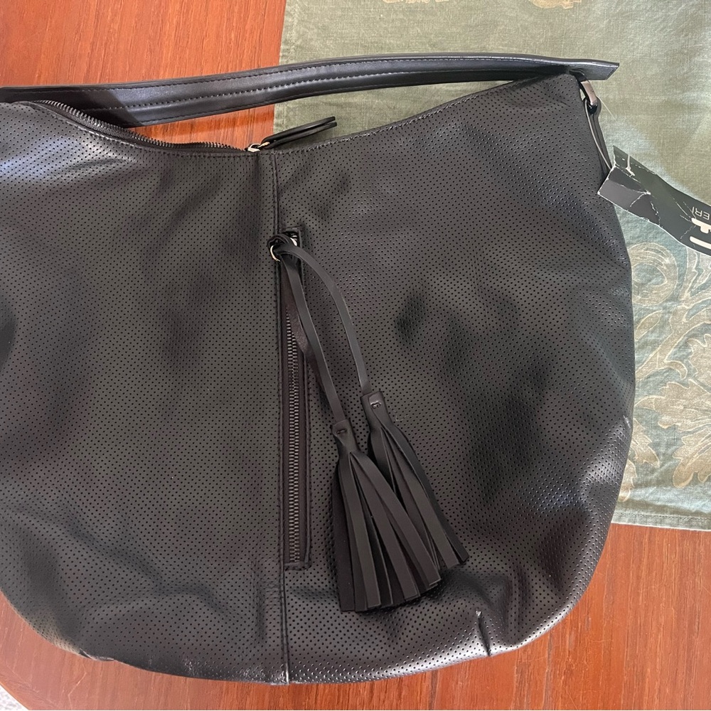 Elegant Black Leather Hobo Bag with Tassel